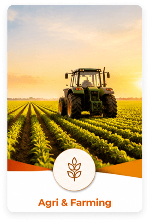 Agri & Farming - a tractor working rows of crops at sunset