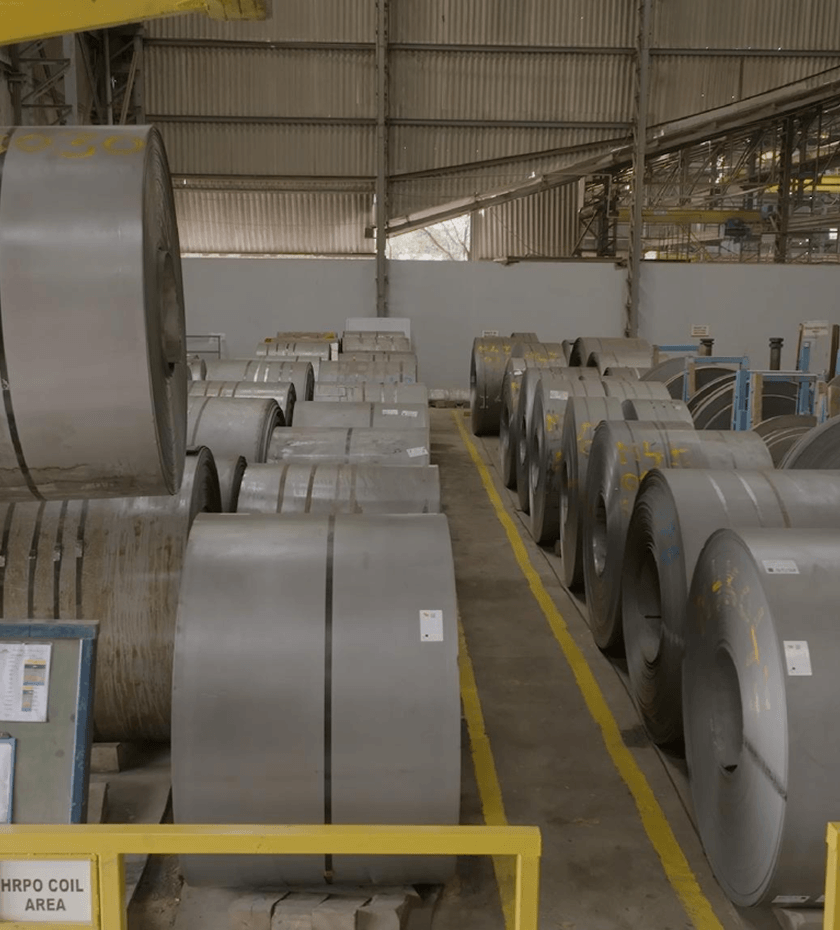 Plant 1, Sanaswadi: steel coil stock held in the raw material bay.